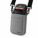 Ingenico POS payment terminal secured in an Agoz gray holster with adjustable crossbody shoulder strap.