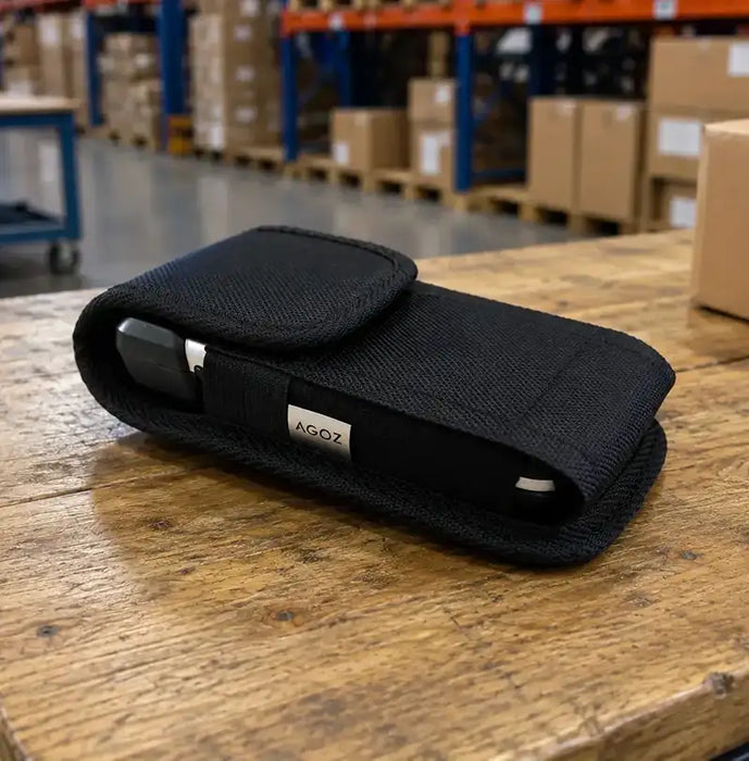 Guardian RFID Spartan 3 case resting on a warehouse workbench with the device secured inside the black AgozTech pouch.