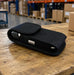 Guardian RFID Spartan 3 case resting on a warehouse workbench with the device secured inside the black AgozTech pouch.