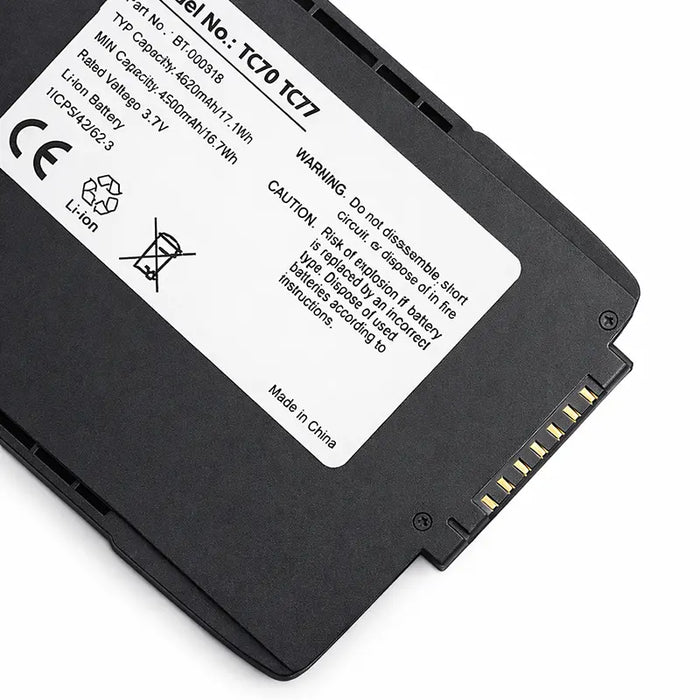 Close-up of Zebra TC7X series replacement battery with warning label and contact pins