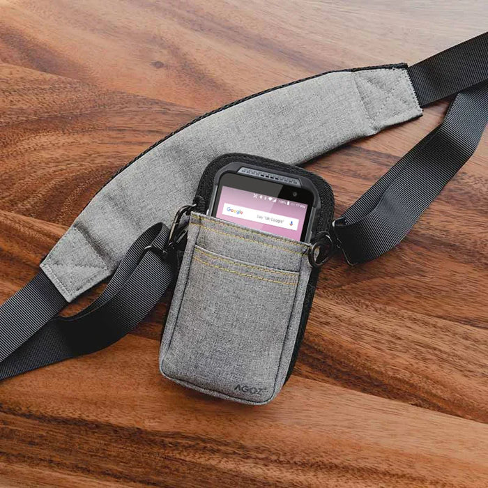 Gray AgozTech Point Mobile scanner holster with crossbody sling on wood surface