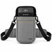 Gray Agoz shoulder sling holster with Castles POS terminal