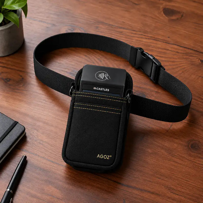 Castles handheld POS terminal in black Agoz holster with waist belt on tabletop