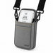 Clover Flex POS terminal secured in gray Agoz holster with shoulder sling attachments