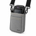 Gray Agoz crossbody holster holding Dejavoo POS terminal