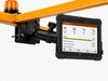 Front view of a JLT tablet mounted on an AgozTech adjustable forklift arm with an active fleet dashboard.