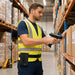Warehouse worker scans inventory on shelving while wearing an AgozTech belt clip holster for a Zebra trigger handle scanner.