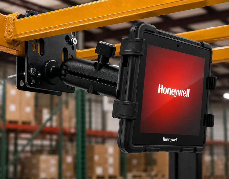 Forklift tablet mount installed in warehouse environment